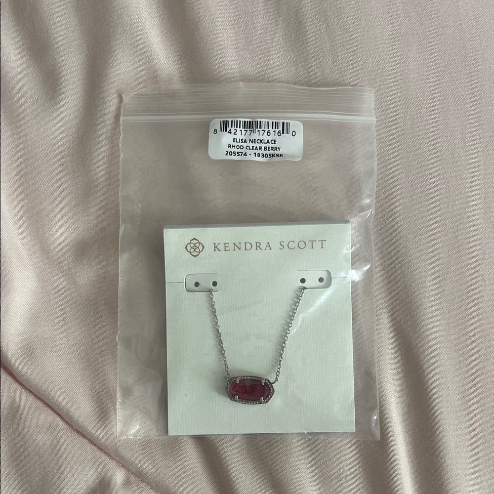 Brand new Kendra Scott Necklace with Clear Berry Red Stone and Silver Setting